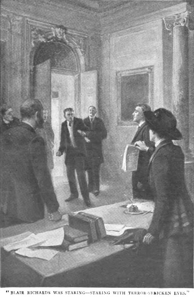 A woman in a hat stands behind a desk, holding up a book between the thumb and forefinger of her right hand. A man in front of the desk cringes back at the sight of the book's cover. Four other men stand around the room, watching.